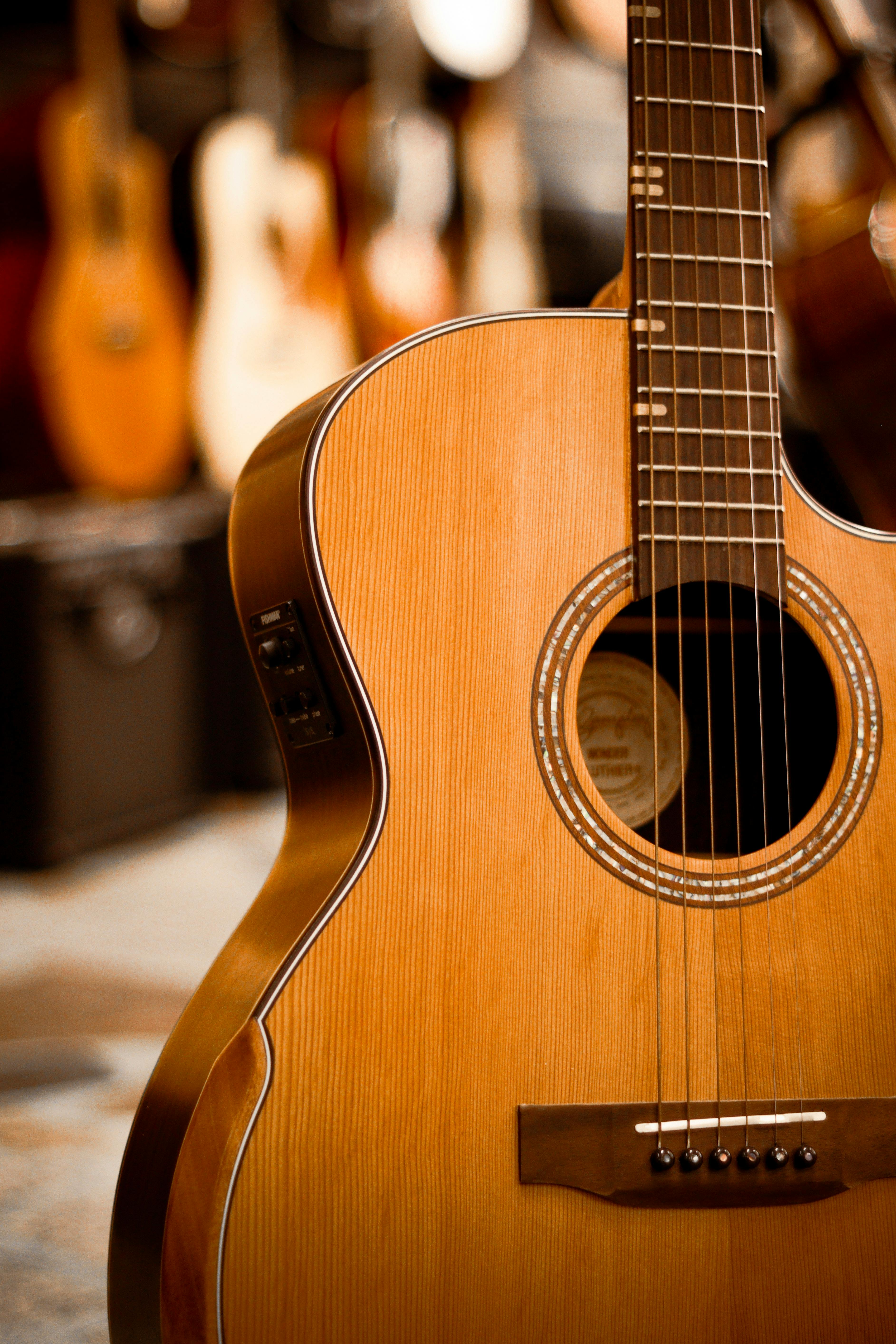 A Brown Acoustic Guitar · Free Stock Photo