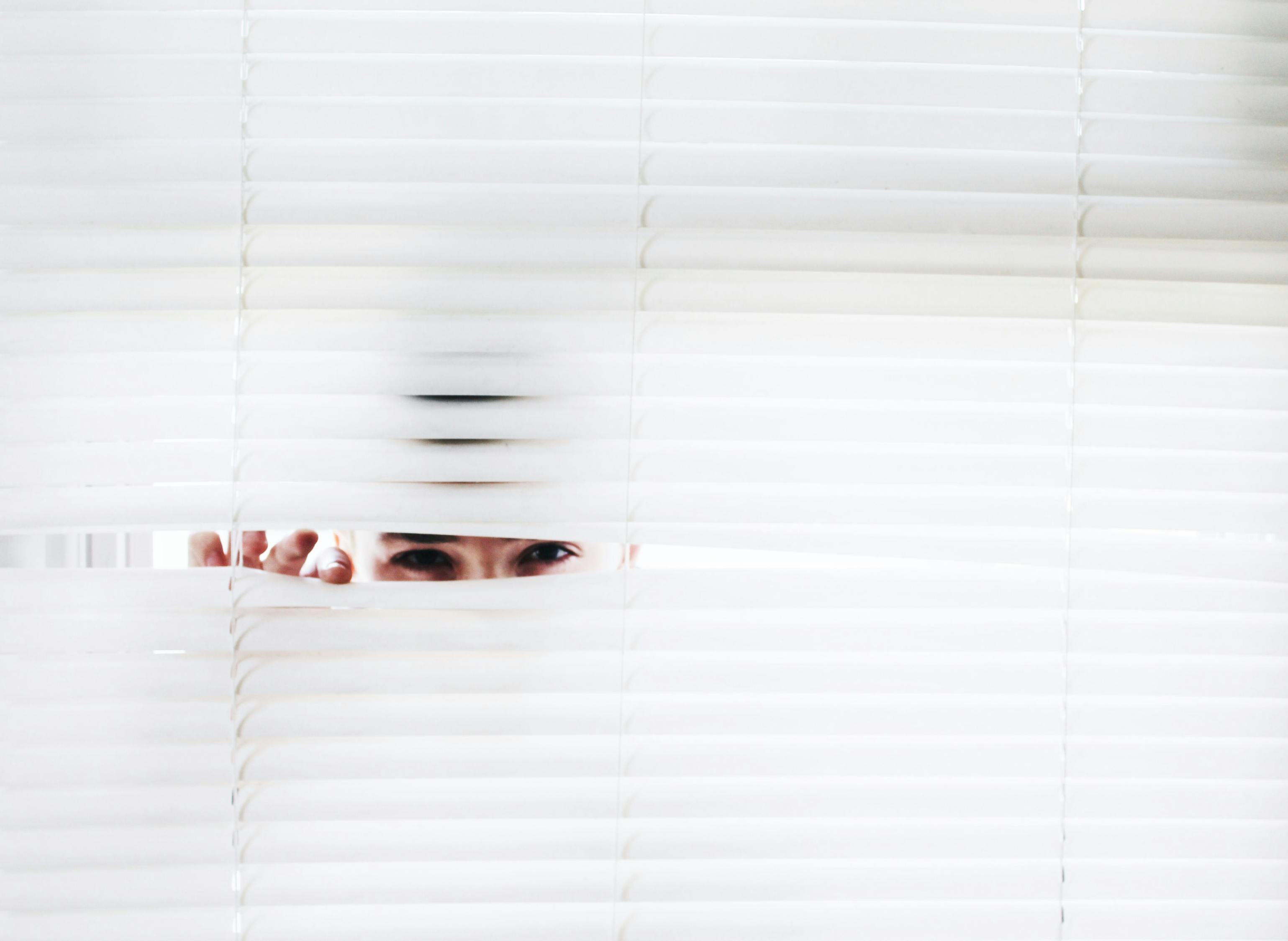 Photography of Person Peeking