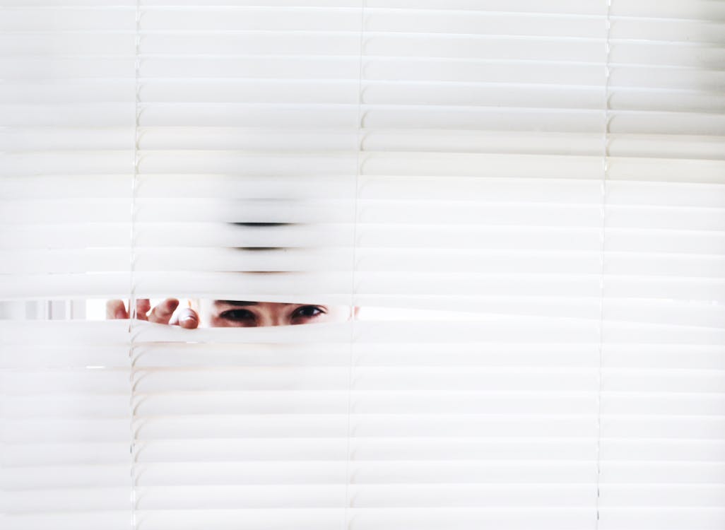 Photography of Person Peeking