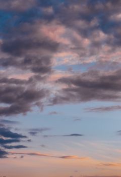 A breathtaking view of a colorful sky during sunset with dramatic clouds and vibrant hues.