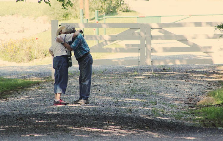 Two Person Hugging Each Other