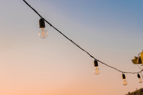 String Light Bulbs Under the Blue Sky