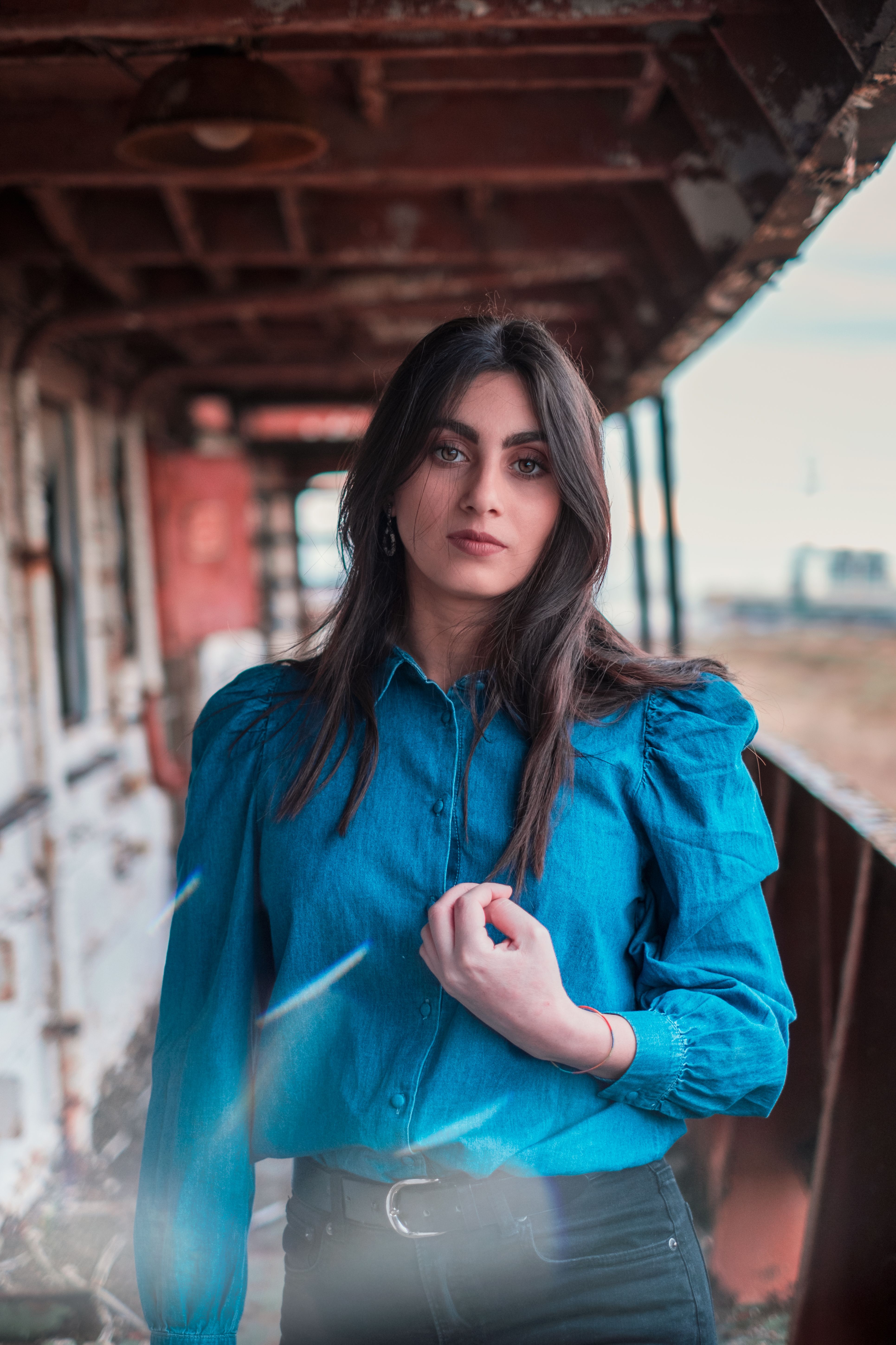 A Woman in Blue Long Sleeve Shirt · Free Stock Photo