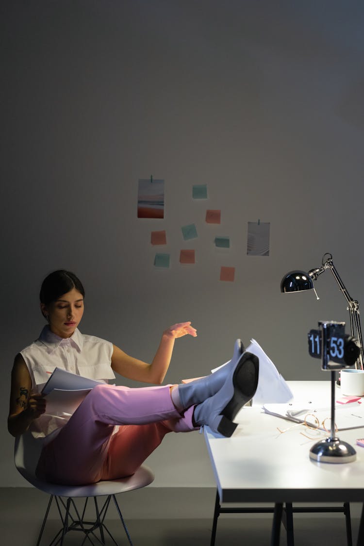 Woman Putting Feet On The Desk