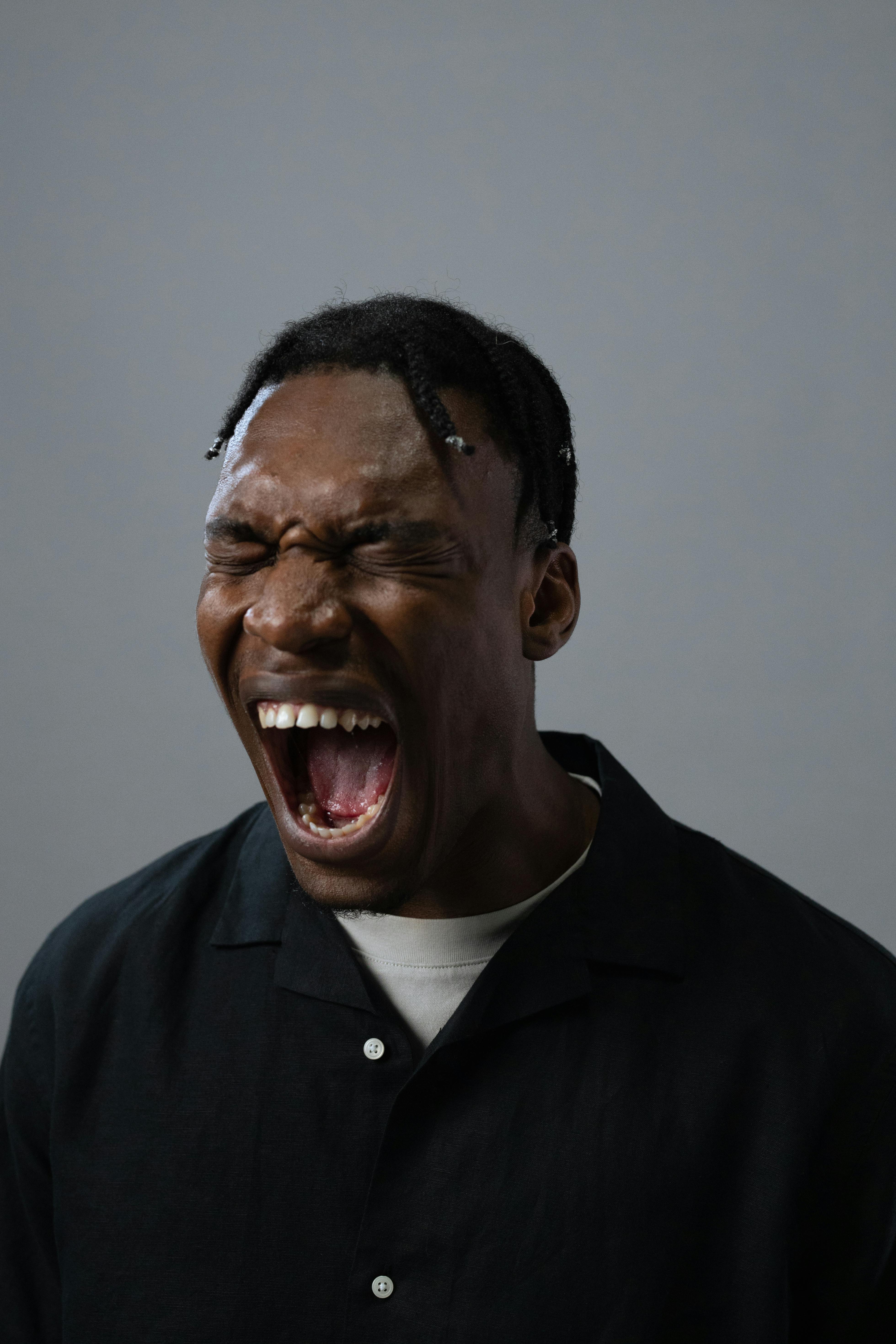 Man With Closed Eyes and Open Mouth · Free Stock Photo