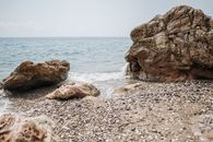 Brown Rock Formation on Sea Shore