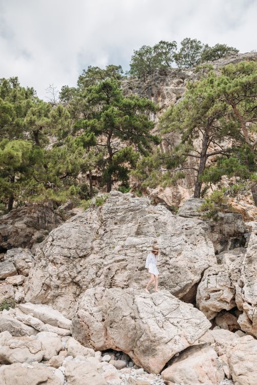 Woman Standing on Rock Formation · Free Stock Photo