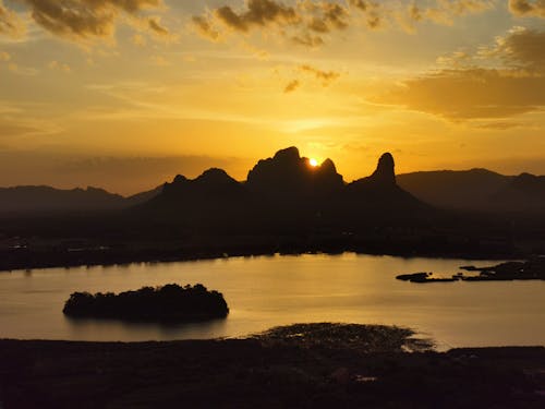 Silhouette of Mountain During Sunset