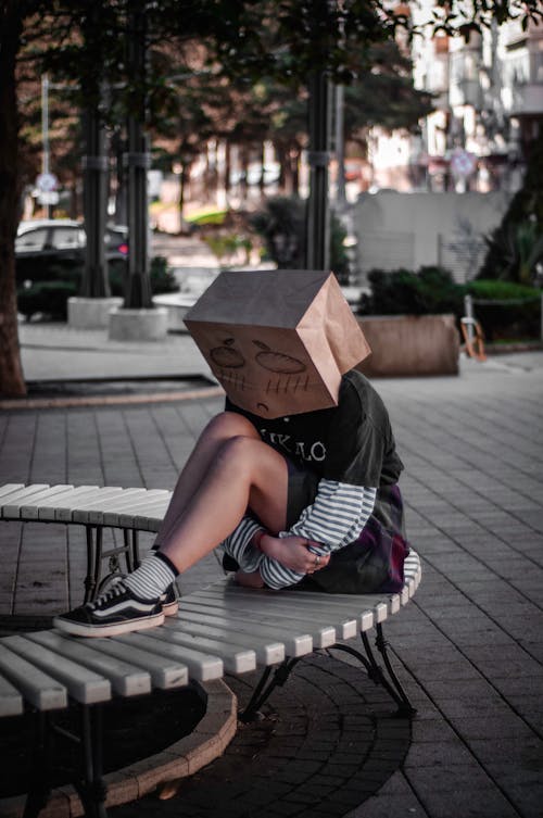 A Person Sitting on the the Bench