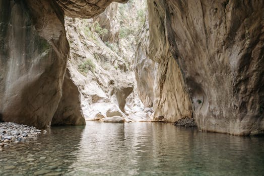 Explore the serene beauty of Göynük Canyon in Turkey, showcasing clear waters and majestic cliffs.