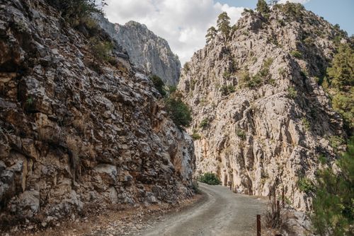 Free Explore the rugged beauty of a rocky mountain path in a natural landscape. Stock Photo
