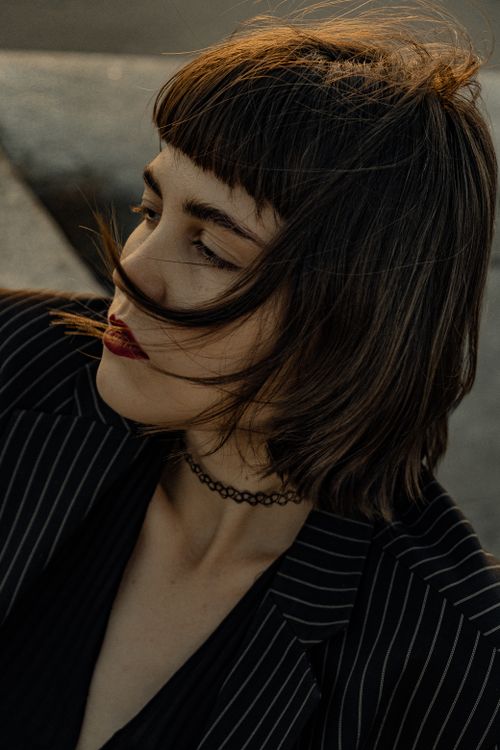 Free Portrait of an elegant woman with retro style outdoors in Saint Petersburg, showcasing sophistication. Stock Photo