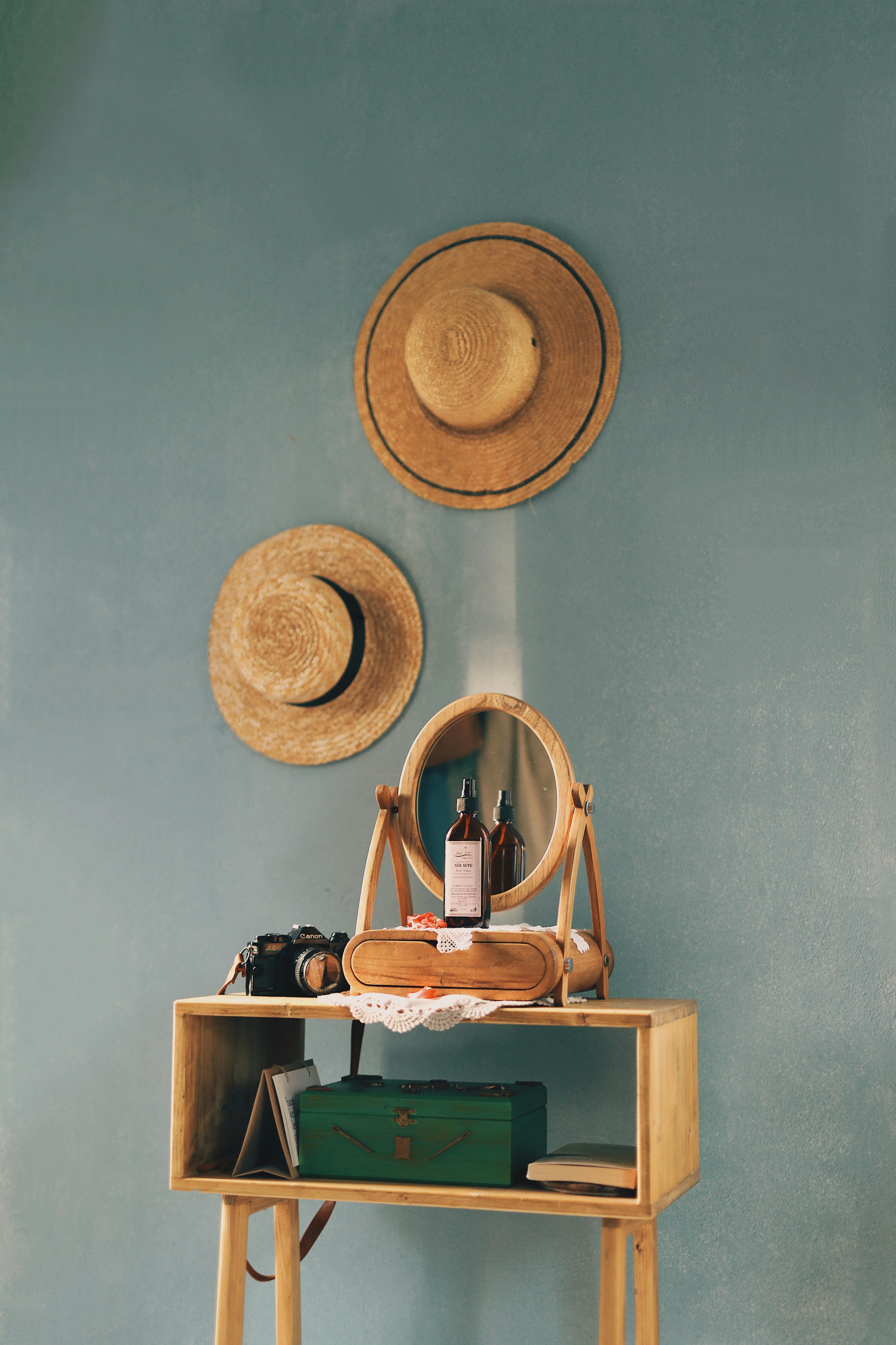 Vanity Table and Hats on Wall · Free Stock Photo
