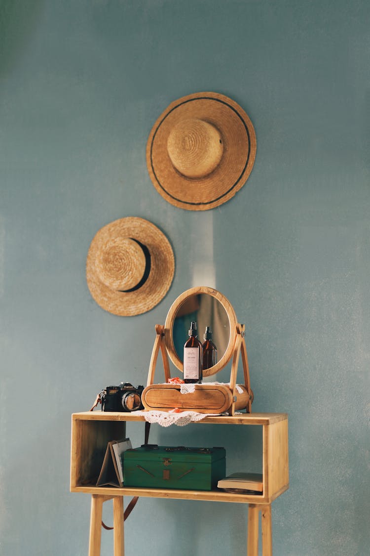 Vanity Table And Hats On Wall