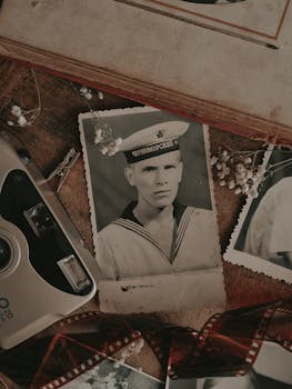Soviet naval portrait with retro camera and flowers, evoking nostalgia.
