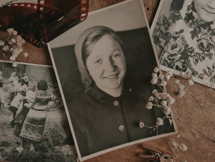 Close-Up Shot Of Vintage Photos