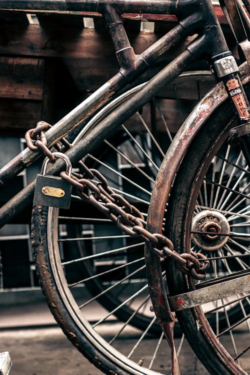 Free A Chained Bicycle with Padlock Stock Photo
