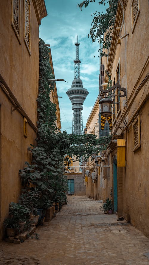 Free View of the Kashgar TV Tower from an Alley Stock Photo