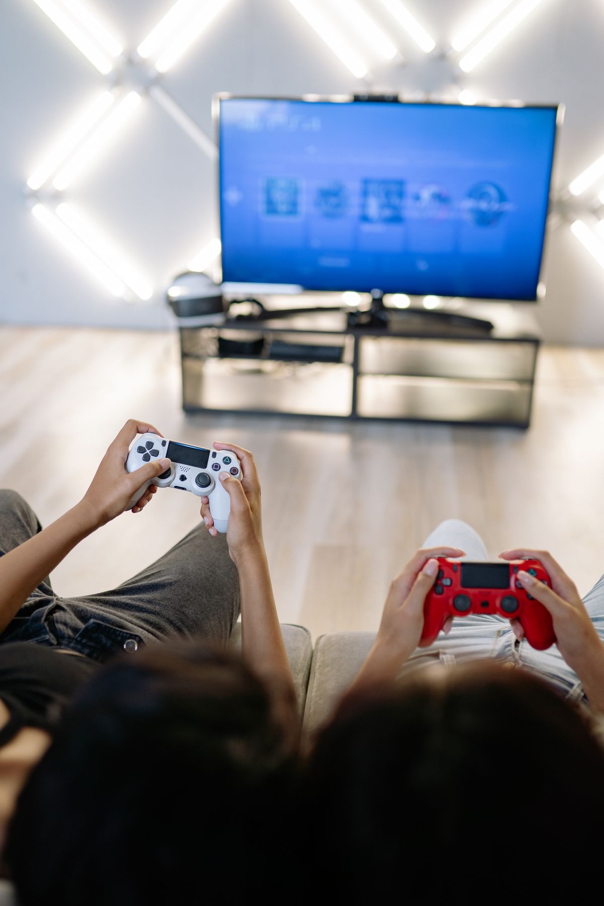 Friends playing an online multiplayer game together on consoles
