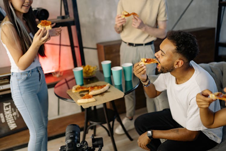 Friends Eating Pizza Together