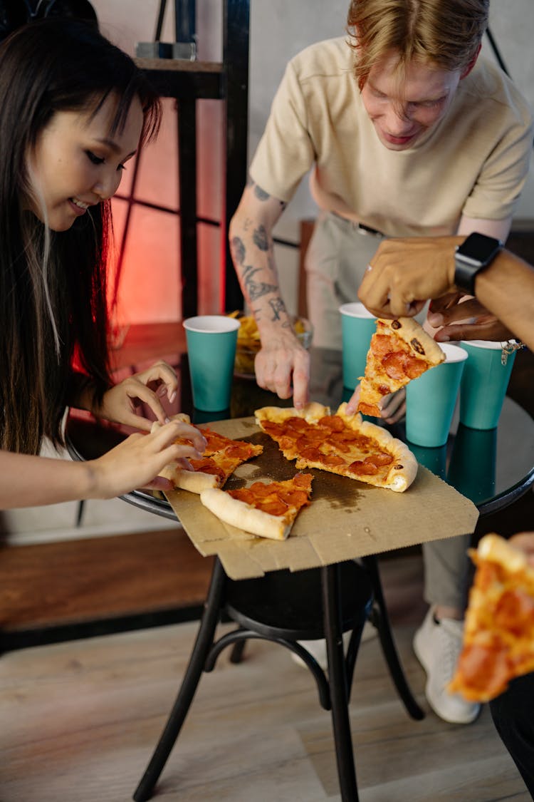 Friends Eating At The Table