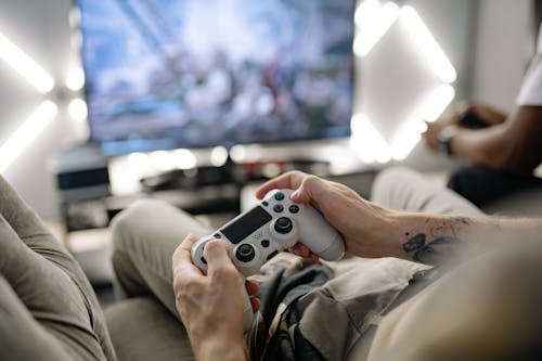 Close-Up Shot of Person Holding a Game Controller