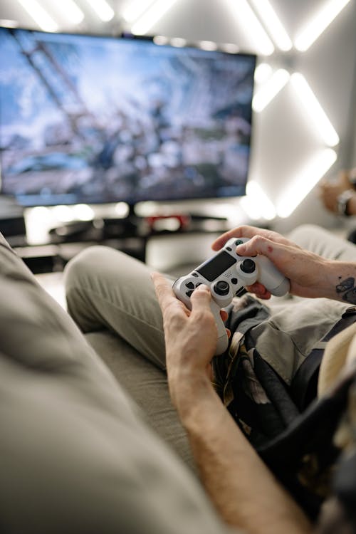 Close-Up Shot of Person Holding a Game Controller