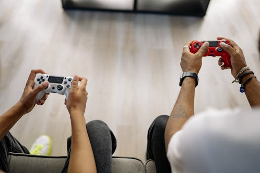 Two friends enjoying a video game session indoors with remote controllers.
