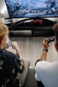 Two men playing video games together at home, enjoying a leisure activity.