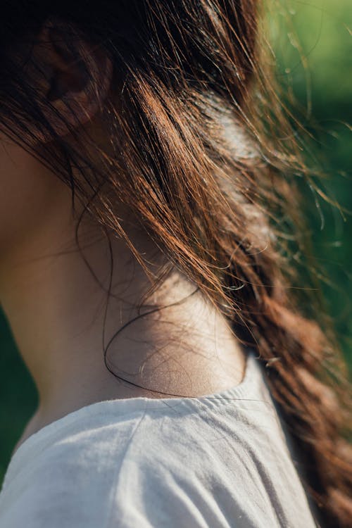 Close-Up Shot of a Neck of a Woman