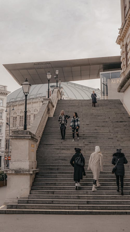 People Walking on the Stairway