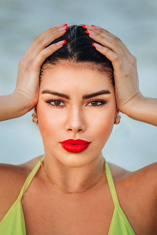 Woman with Red Lipstick Looking at Camera