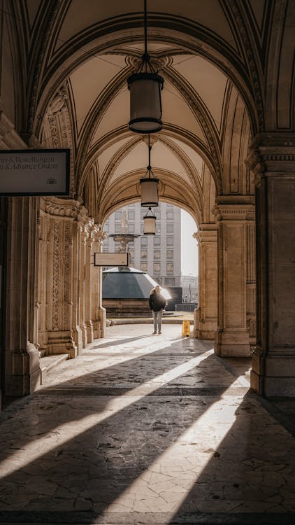 A Person Walking on the Hallway · Free Stock Photo