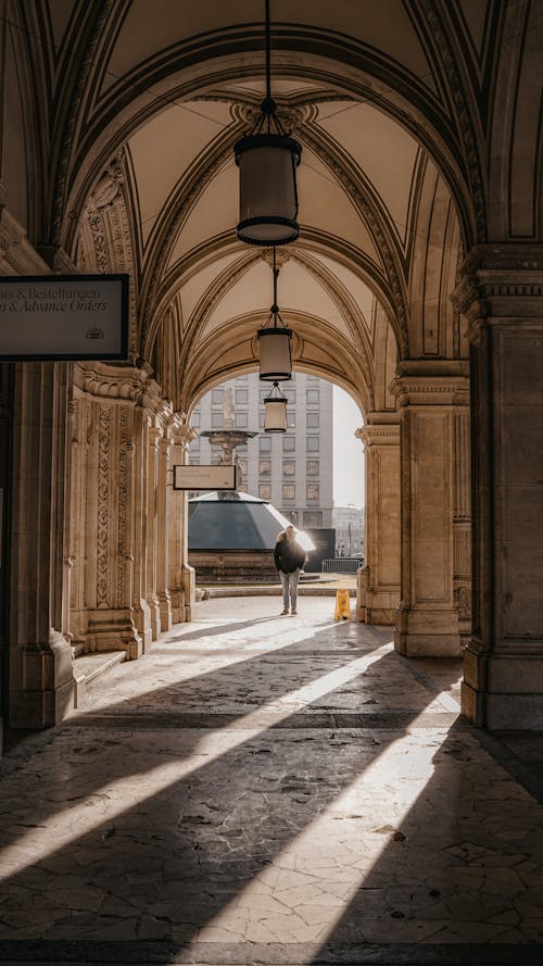 A Person Walking on the Hallway