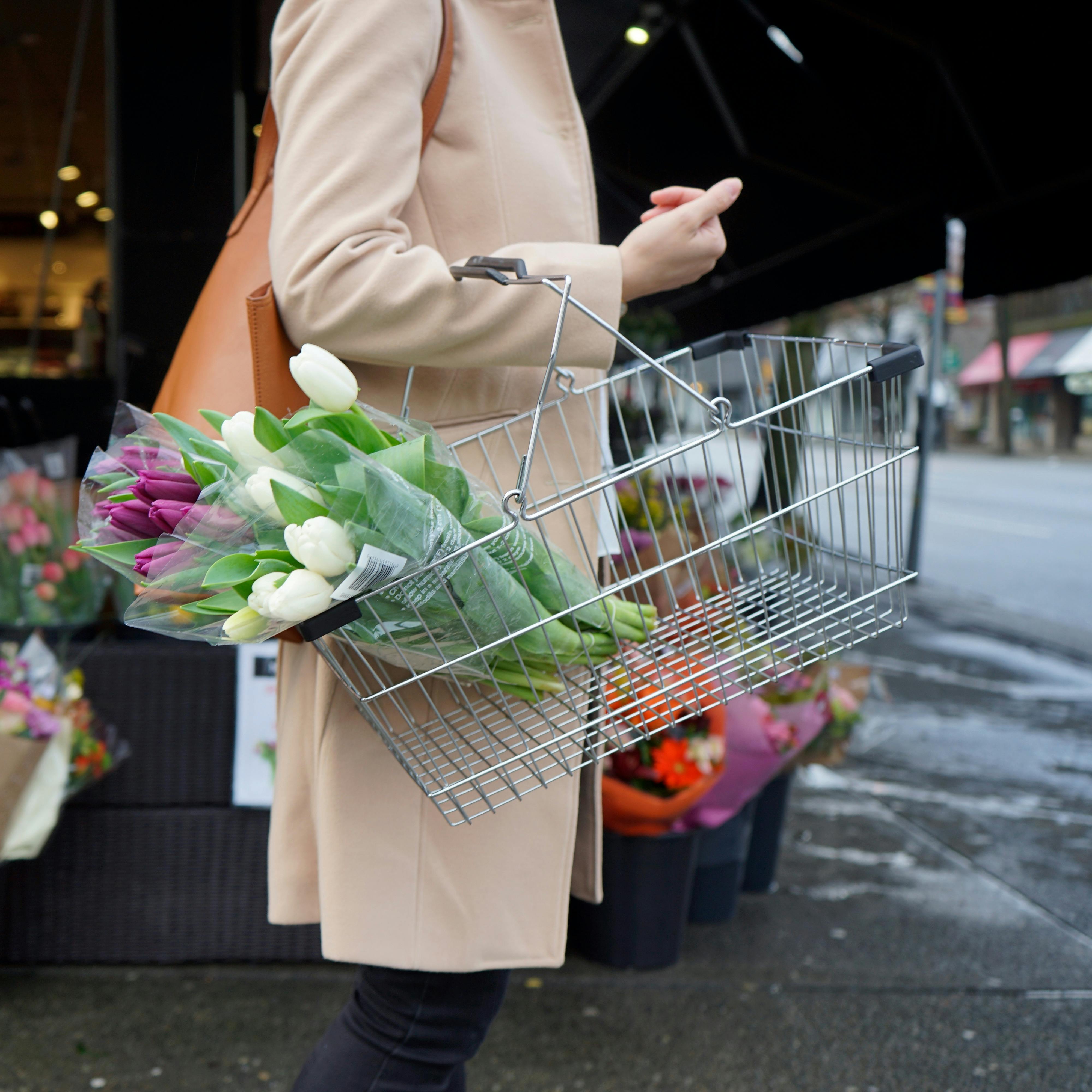 A Person Holding a Basket