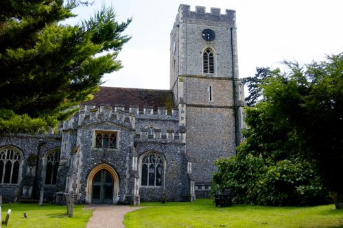 Free A picturesque medieval church set amidst lush greenery in Watton at Stone, England. Stock Photo