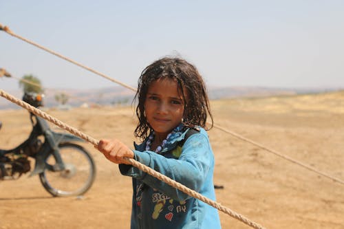 Free A Girl Looking at the Camera Stock Photo