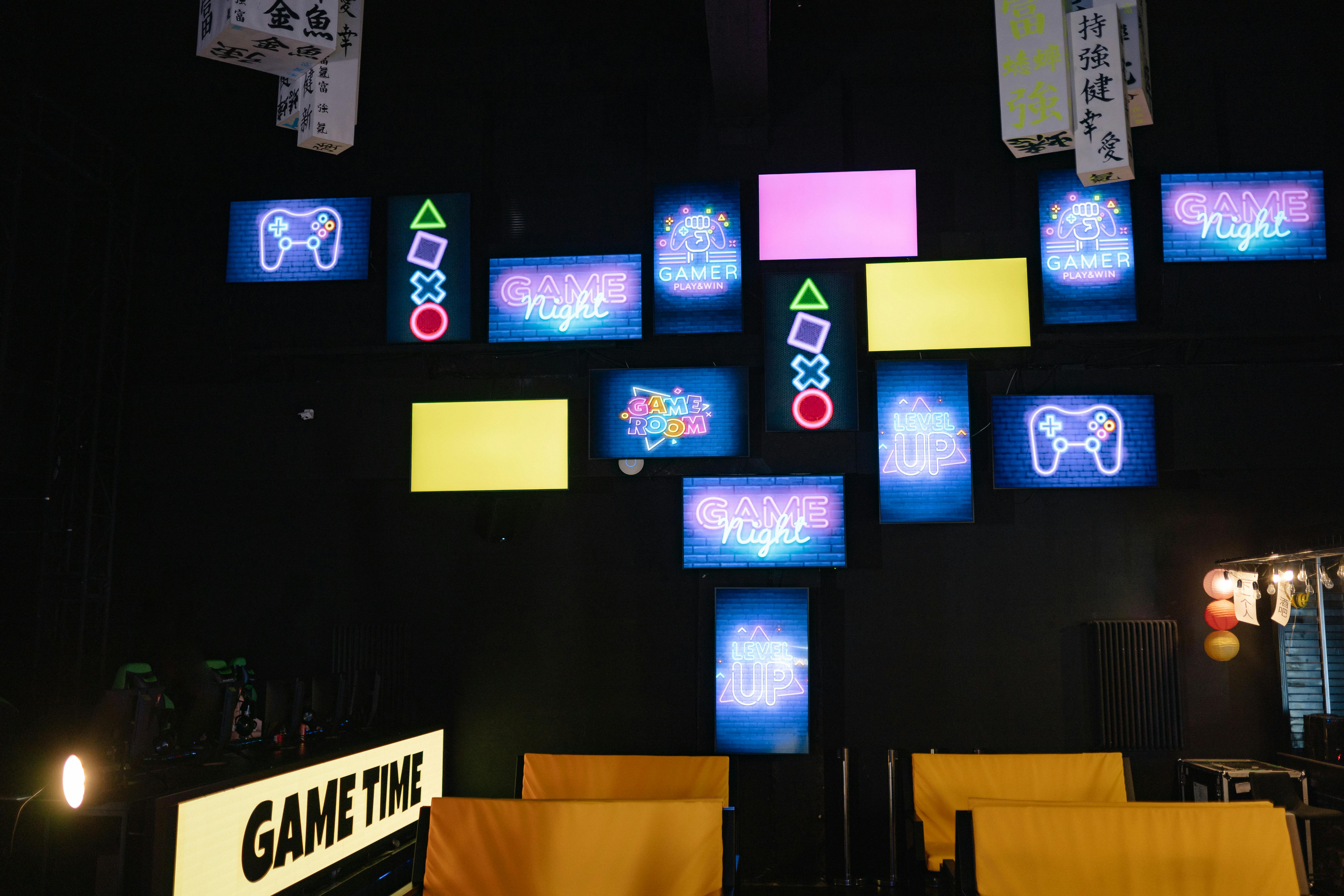 neon signages inside a computer gaming shop