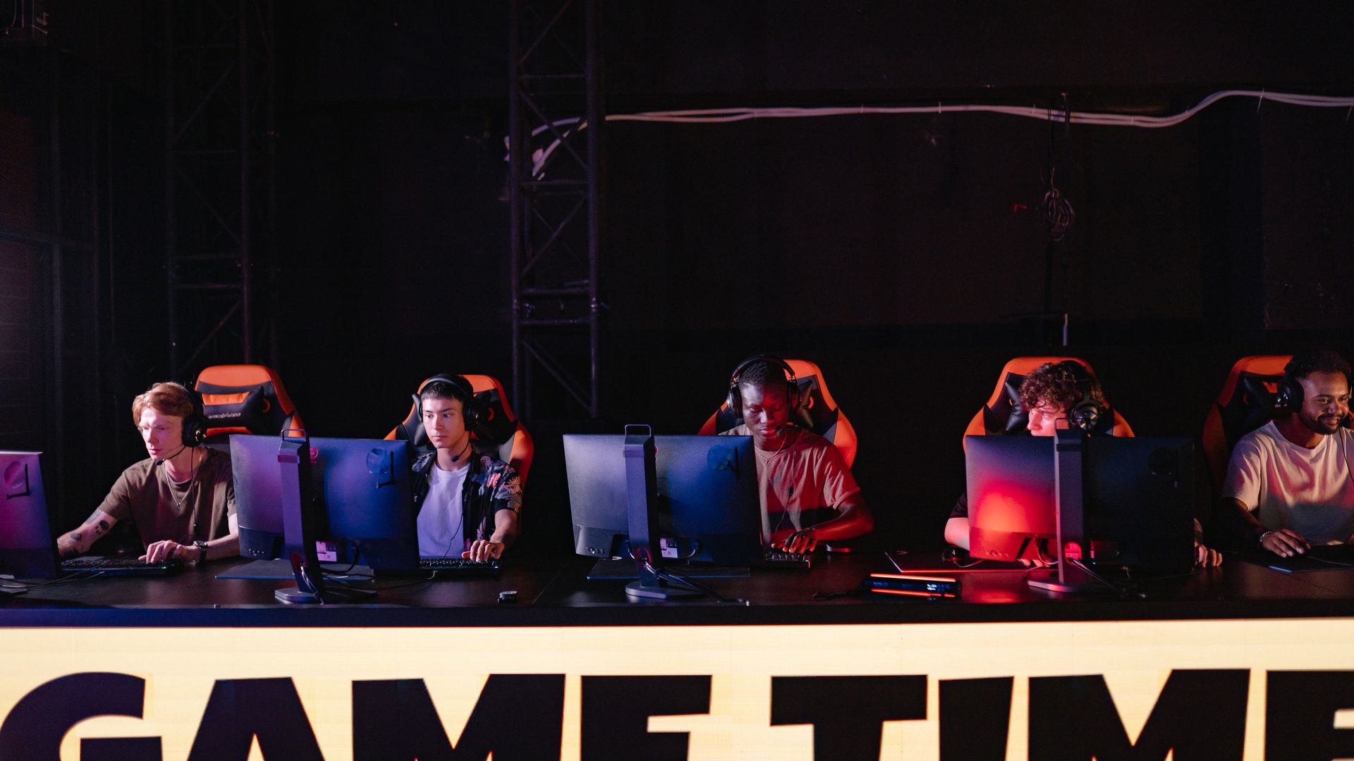 Modafinil for Esports Players: Enhancing Performance 3 A group of diverse gamers participating in an online eSports tournament indoors — modafinil for esports players