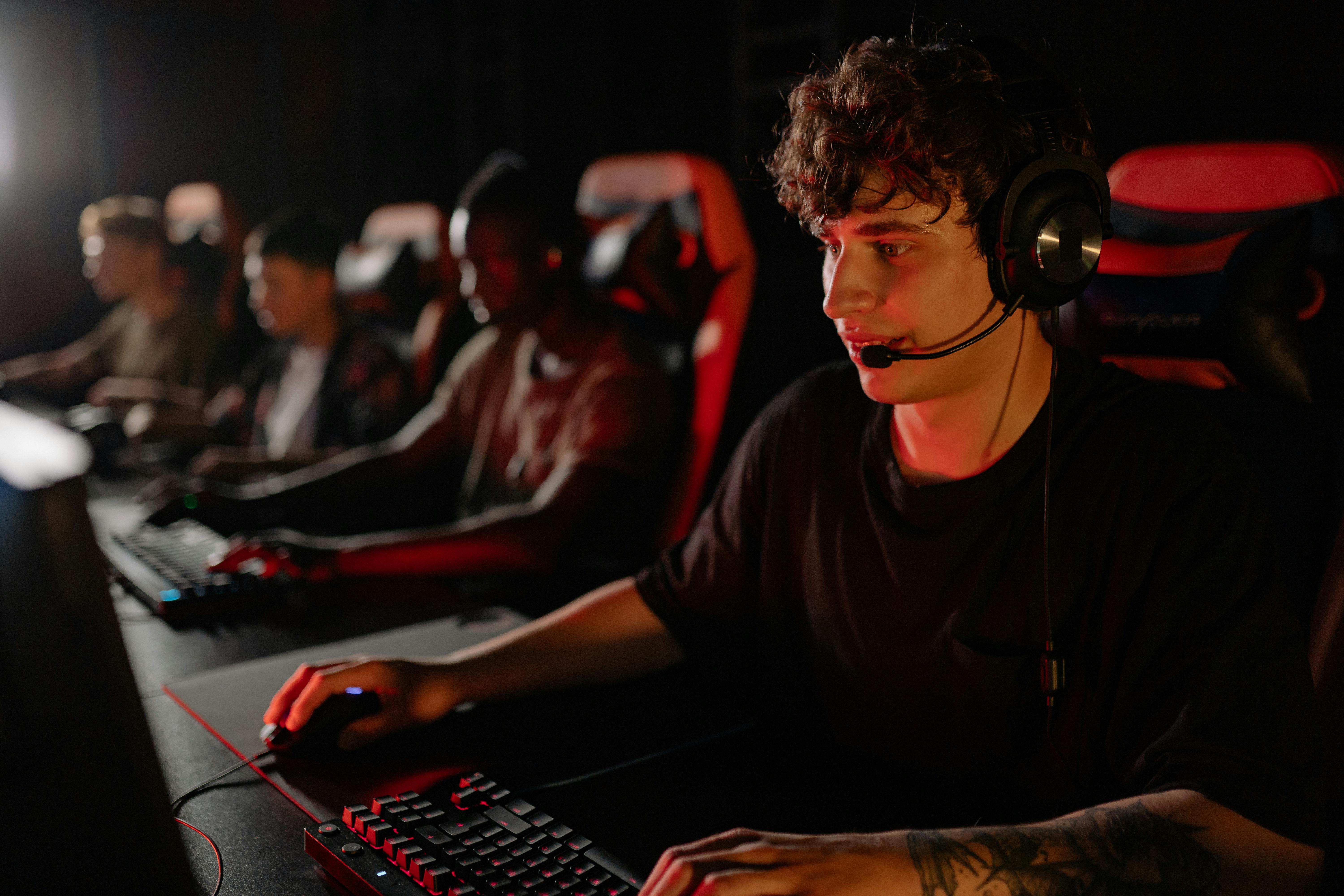 a man looking serious in playing a video game