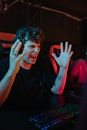 Photo of a Man in a Black Shirt Screaming