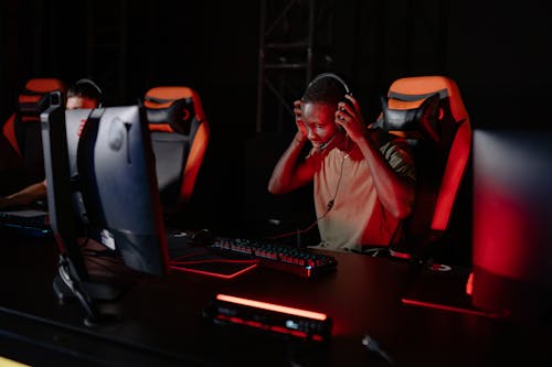 Man Sitting in Front of a Computer