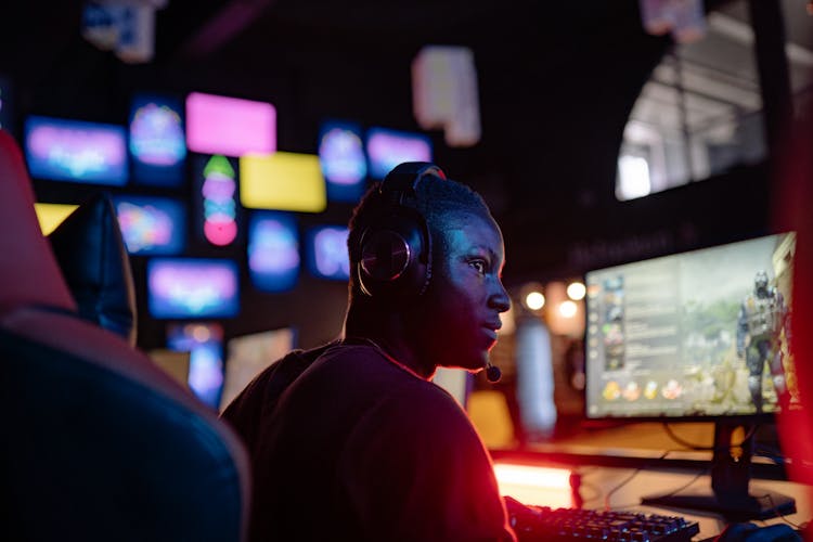 A Man Playing A Computer Game