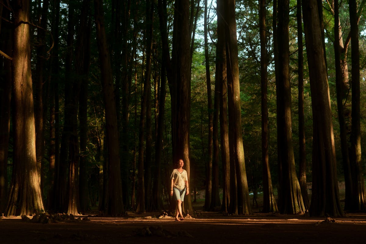 Two people from different generations playing on a retro gaming handheld together