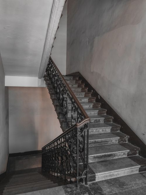Free Elegant vintage staircase with ornate railing in St. Petersburg, Russia. Stock Photo