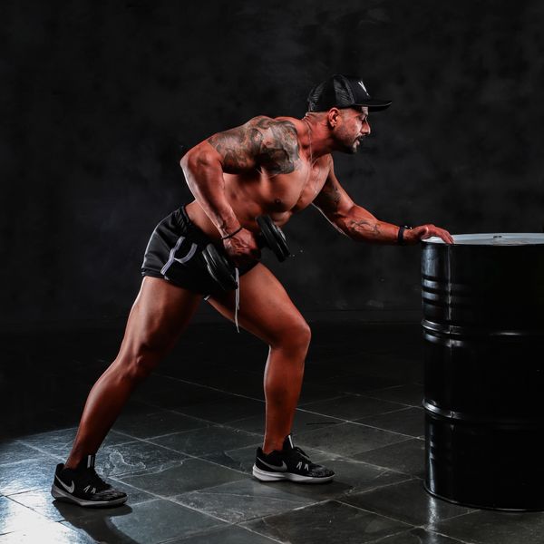 Dumbbell resting on a floor during a home workout — photo by Wagner Robson on Pexels