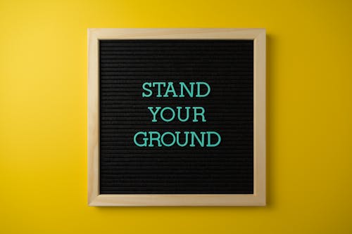 Free Text Board on Yellow Background Stock Photo