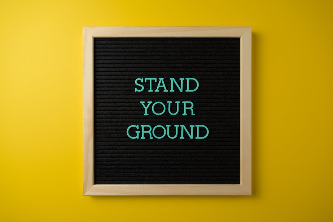 Free Text Board on Yellow Background Stock Photo