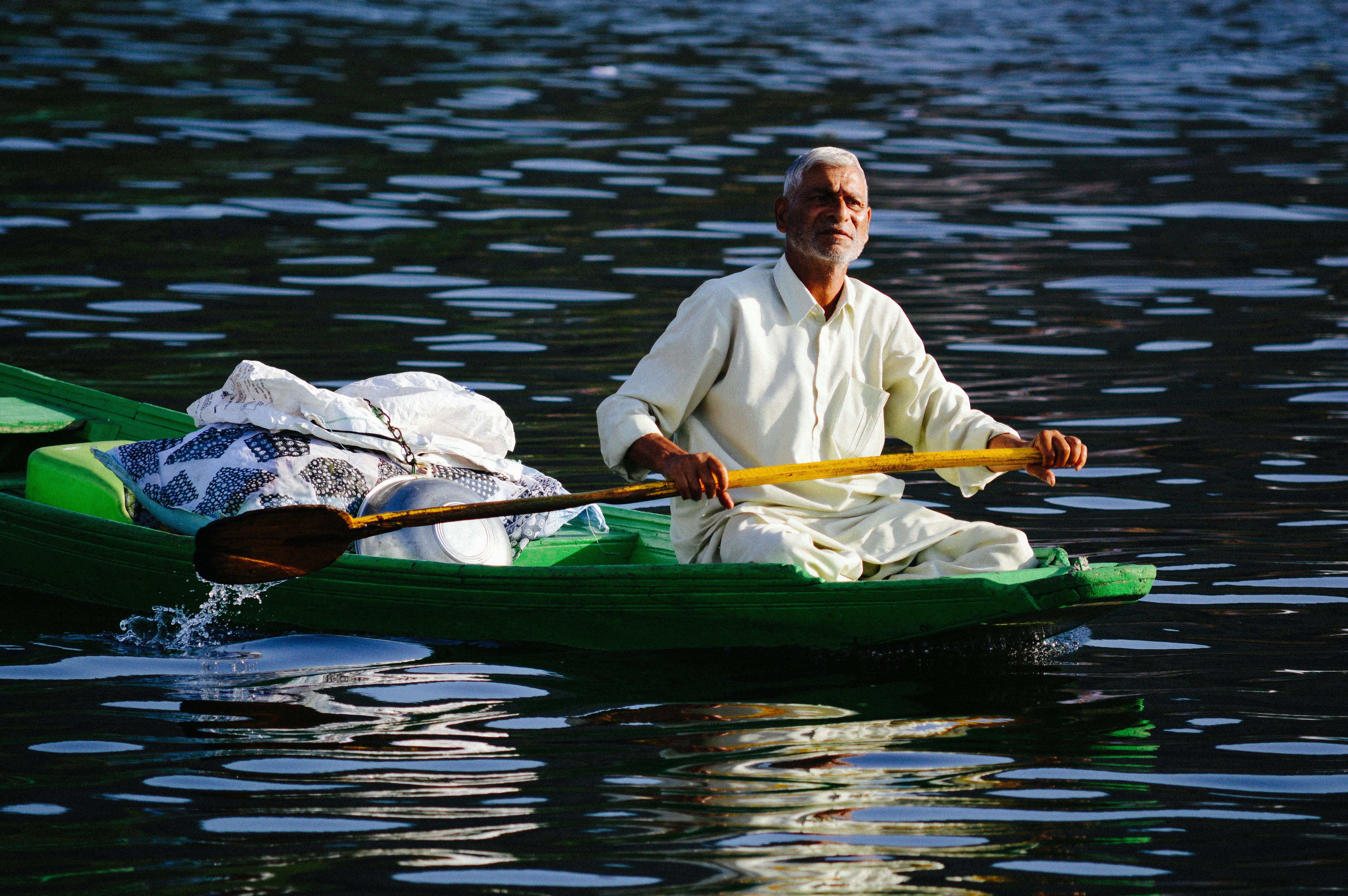 Man On A Boat Paddling Free Stock Photo   Pexels Photo 9073921 