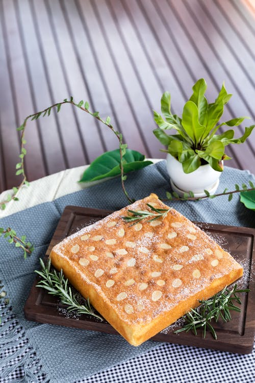 Brown Cake on Wooden Chopping Board